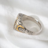 Daintree | "Cosmic Zen" | Hand-sculpted Platinum Signet with Natural Colour Change Alexandrite side view - Buddha