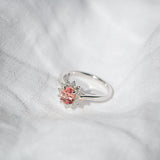 Kimberley | 'Pantai Merah' | Padparadscha Sapphire Halo Ring front tilted view
