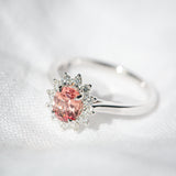 Kimberley | 'Pantai Merah' | Padparadscha Sapphire Halo Ring closeup front tilted view