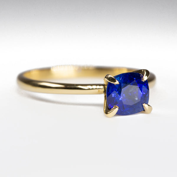 Solitaire Cushion Royal Blue Sapphire Ring - angled