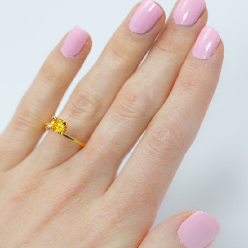 1.02Ct Vivid Yellow Sapphire | Cushion Shape on ring finger