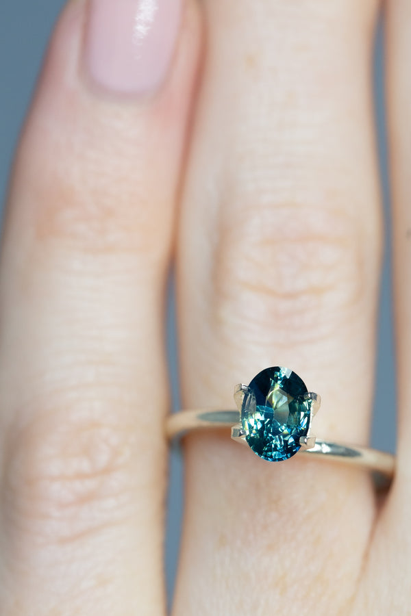 1.32Ct Blue Green Madagascan Sapphire | Oval Shape on finger