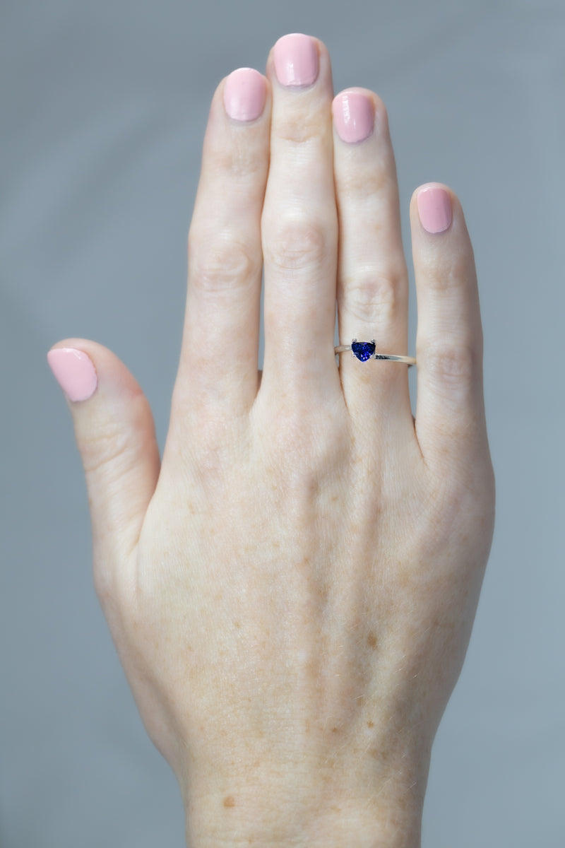 0.63Ct Royal Blue Ceylon Sapphire | Trillion Shape  on hand