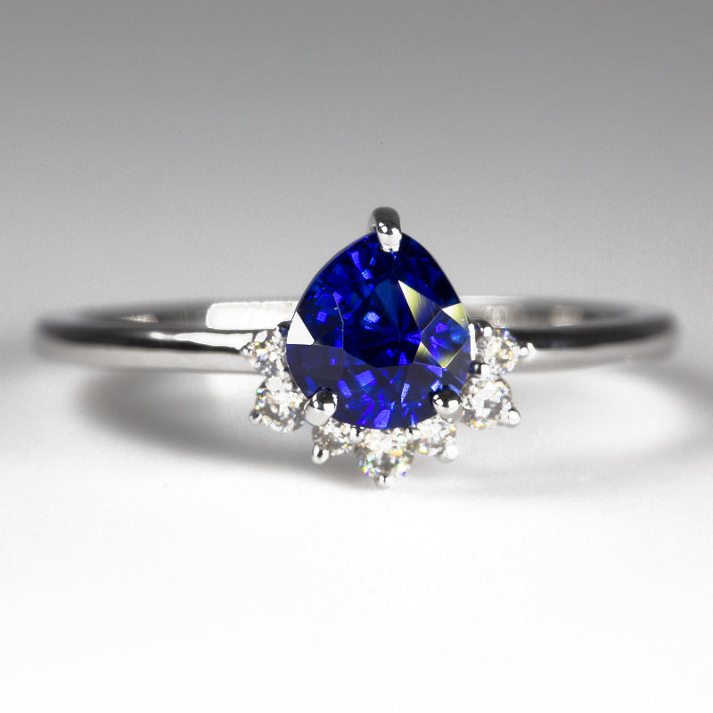 Close up of Royal Blue Pear Sapphire & Diamonds Ring - front view 1
