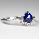 Close up of Royal Blue Pear Sapphire & Diamonds Ring  - angle view 2