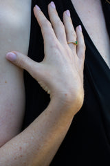 Emerald Green Tsavorite & Diamonds Ring on engagement finger