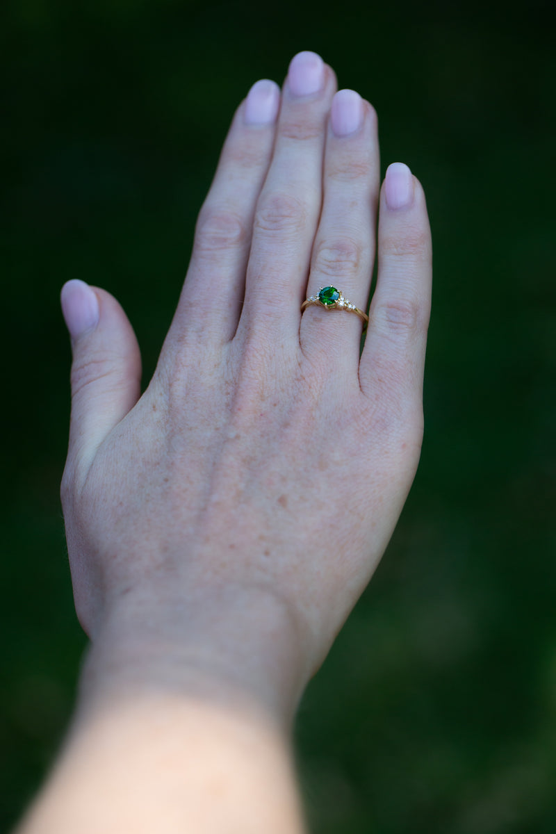 Emerald Green Tsavorite & Diamonds Ring on hand