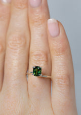 Deep 1.31Ct Intense Blue Green Teal Sapphire | Cushion Shape from Madagascar on ring finger