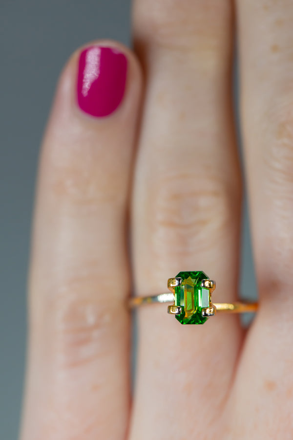 1.24Ct Vivid green Kenyan Tsavorite | Emerald Shape on ring finger