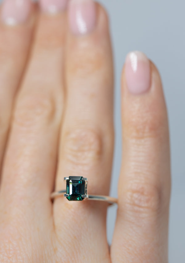Immersive 1.49Ct Peacock Blue Sapphire | Emerald Shape on ring finger