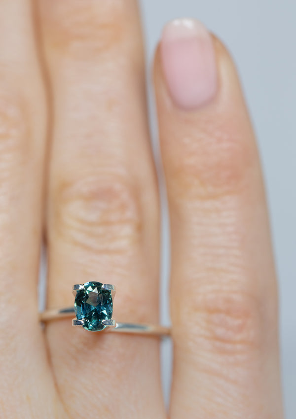 Beautiful 1.03Ct Tiffany Teal Sapphire | Oval Shape from Madagascar on ring finger