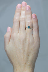 0.68Ct Neon Blue Paraiba Tourmaline | Oval Shape on hand