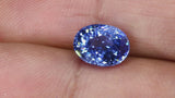 3.06Ct Vivid Blue Sapphire | Oval Shape from Sri Lanka on fingers