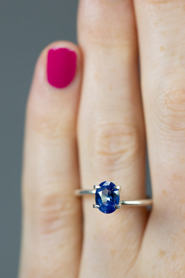 1.58Ct Sweet Blue Ceylon Sapphire | Oval Shape on ring finger