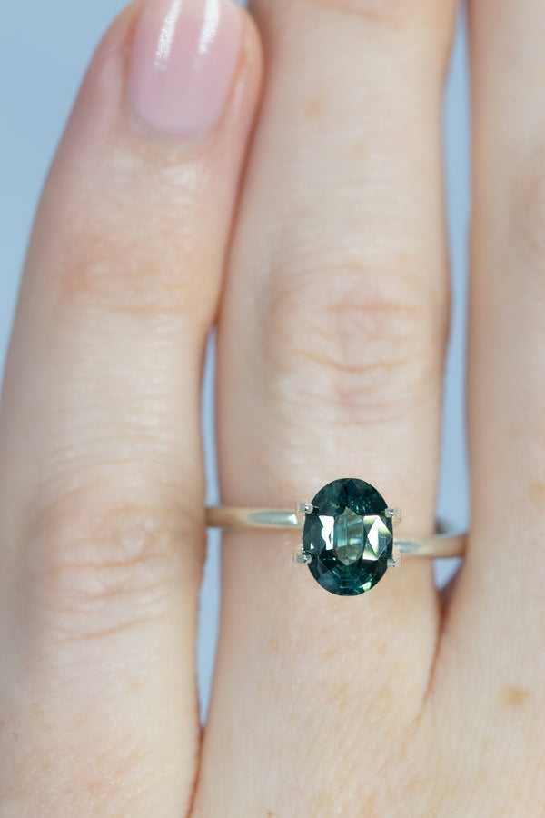 1.53Ct Seaform Green Teal Madagascan Sapphire | Oval Shape on finger