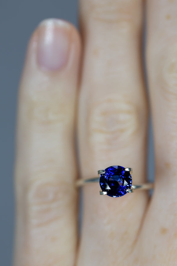 1.83Ct Royal Blue - Violet Bi-Colour Ceylon Sapphire | Round Shape on ring finger