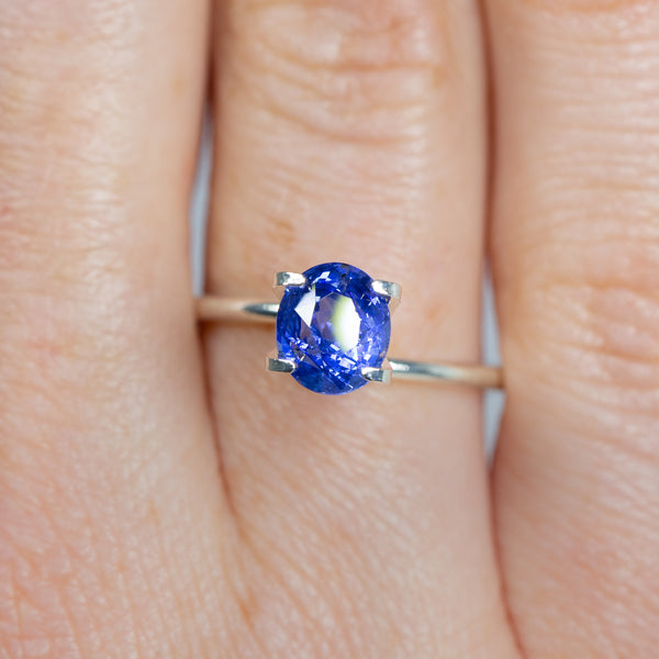 2.03Ct Cornflower Blue Sapphire | Oval Shape on ring finger