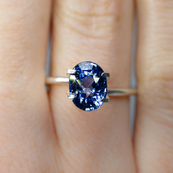 3.06Ct Vivid Blue Sapphire | Oval Shape from Sri Lanka on finger