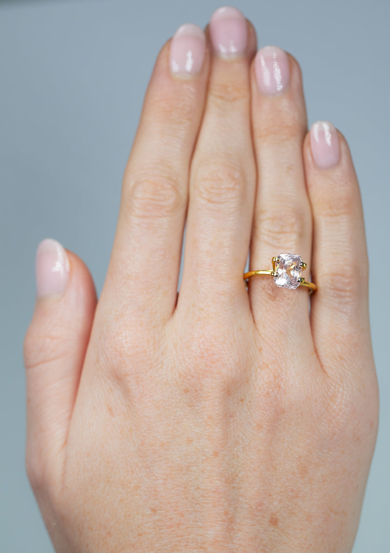 3.58Ct Light Peach Sapphire | Emerald Shape from Sri Lanka on ring finger