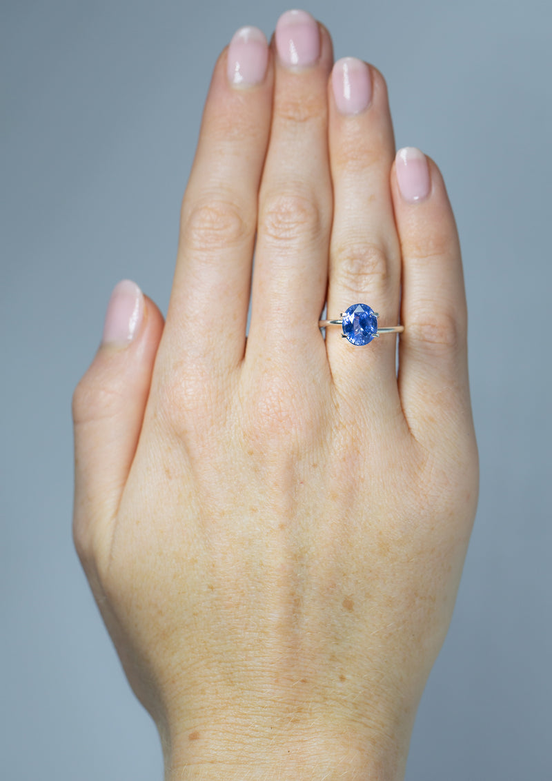 Beautiful 3.53Ct Cornflower Blue Sapphire | Oval Shape from Sri Lanka on hand