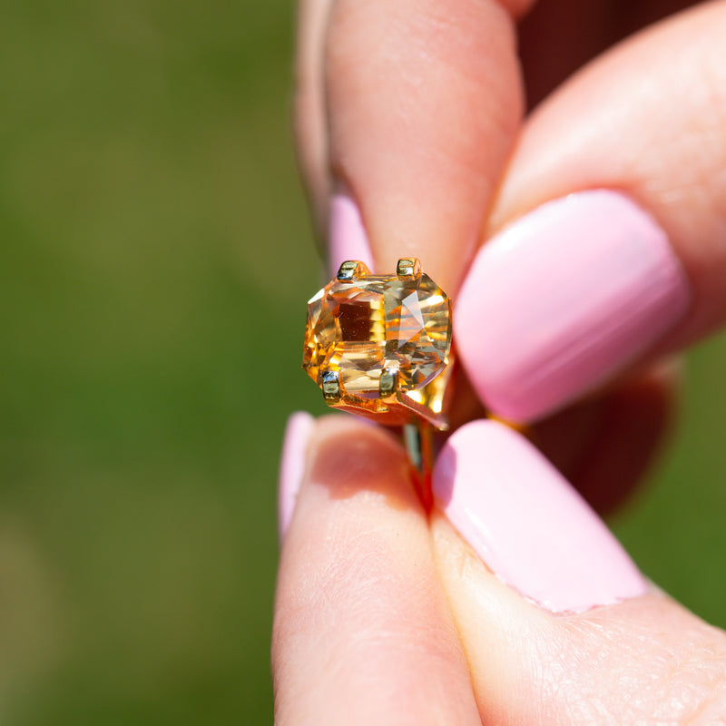 4.56CT Unheated Peachy Yellow Ceylon Sapphire on ring finger