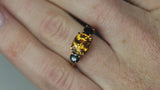 Video of  Golden Yellow Sapphire and dark spinel ring on finger