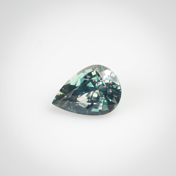 0.16Ct Bluish Green to Reddish Purple Alexandrite | "Petite Alexandra" | Pear Shape white light view