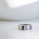 Indian Ocean | Quiet Confidence - Vivid Blue Sapphire Wide Ring daylight front view
