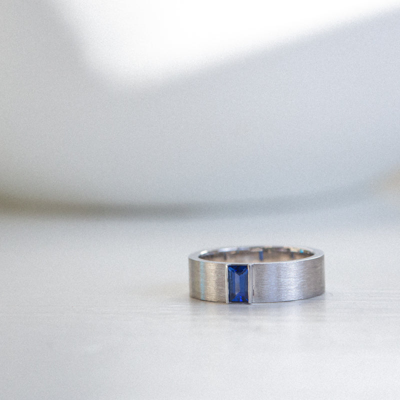 Indian Ocean | Quiet Confidence - Vivid Blue Sapphire Wide Ring daylight front view