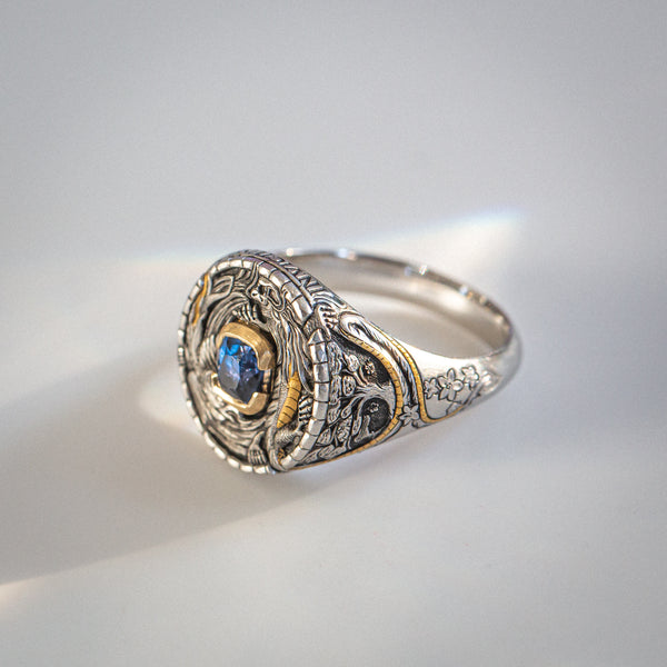 One of one | "Invictus" | Hand sculpted Platinum Signet | Electric Peacock Blue Cobalt Spinel side view