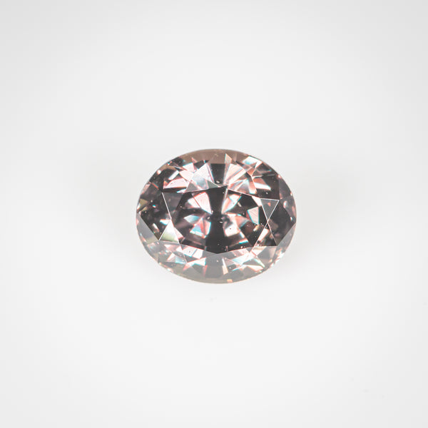 1.16Ct Greenish Orange to Pink Colour Change Sapphire | 'Panther Chameleon' | Oval Shape front view white light