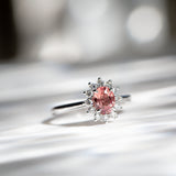 Kimberley | 'Pantai Merah' | Padparadscha Sapphire Halo Ring front contrast light view