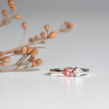 Kimberley | Desert Sunset - Padparadscha Sapphire & Diamond front view with desert flowers