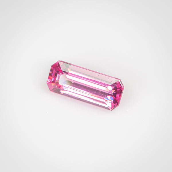 0.55Ct Reddish Pink Mahenge Spinel | Emerald Shape side view