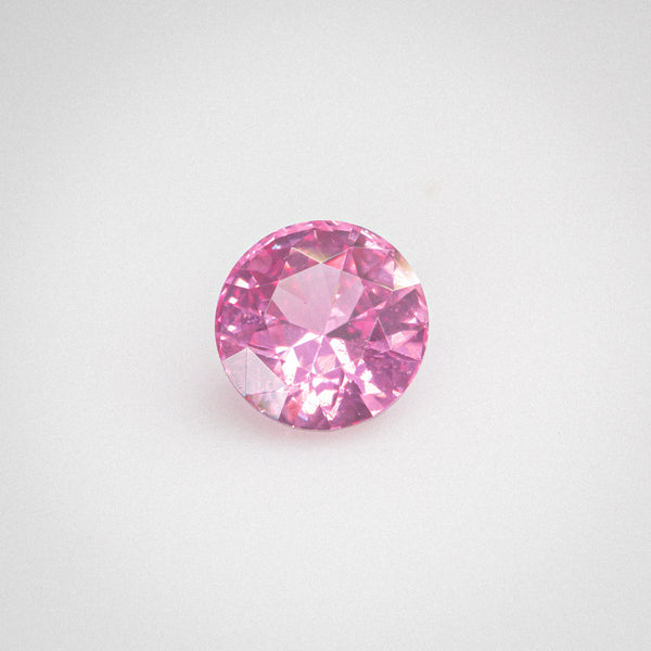 0.6Ct Orangish Pink Padparadscha Ceylon Sapphire | Round Shape