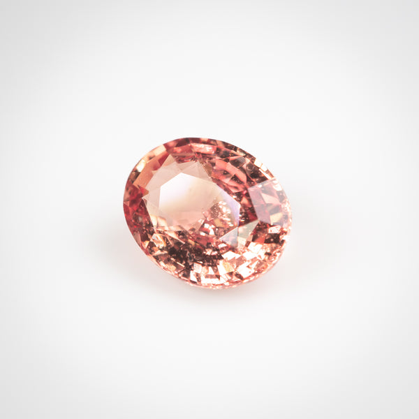 1.51Ct Sunset Pinkish Orange Padparadscha Sapphire | "Masai Mara Sunset" | Oval Shape side view