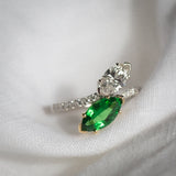 Daintree | Flutter | Toi et Moi - Natural GIA Diamond & Vivid Emerald Green Tsavorite Ring closeup of stones