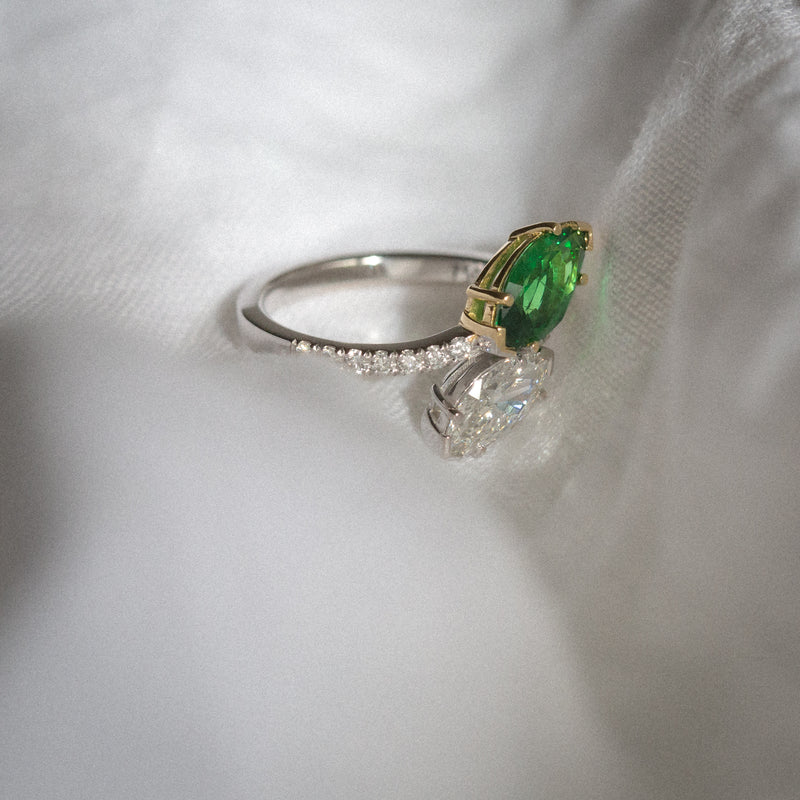Daintree | Flutter | Toi et Moi - Natural GIA Diamond & Vivid Emerald Green Tsavorite Ring top side view