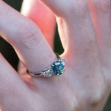 Daintree | Jungle Teal | Teal Blue Sapphire & Diamonds on finger