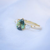 Daintree | "Eucalyptus in the wind" | Parti Australian Sapphire & Diamonds Trilogy Ring angled front view