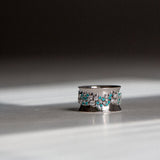 Indian Ocean | Paraiba Cluster - Neon Blue Paraiba Tourmaline & Diamonds Eternity Ring side view from a distance