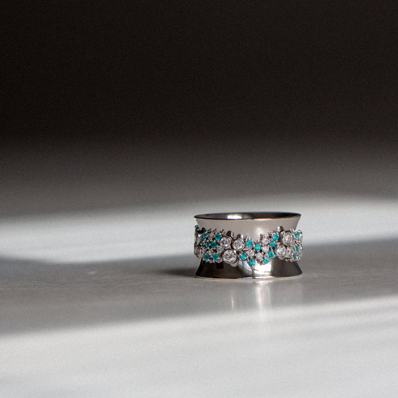Indian Ocean | Paraiba Cluster - Neon Blue Paraiba Tourmaline & Diamonds Eternity Ring side view from a distance