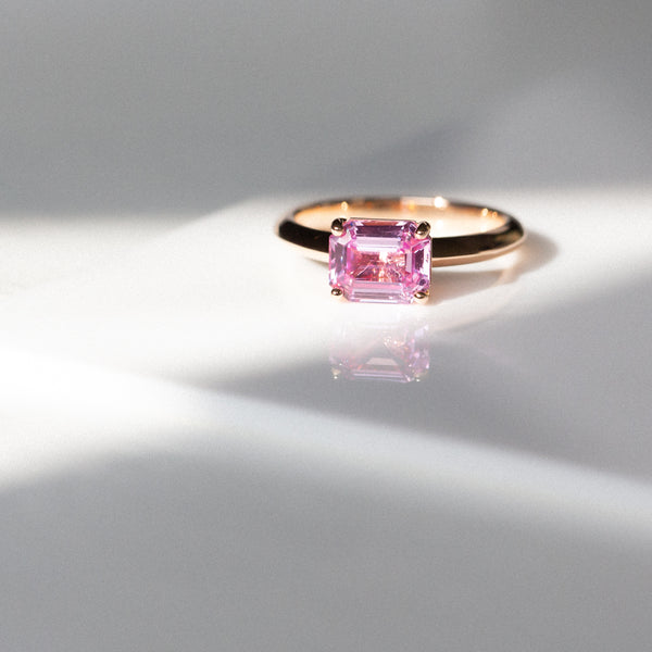 Kimberley | Pink Sunrise - Vivid Pink Sapphire Solitaire top down angled view