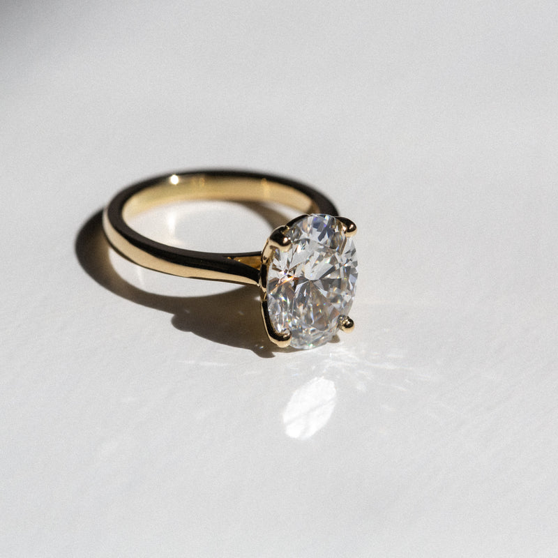 Byron Bay | Classic Oval Solitaire - 3.3Ct GIA Certified D, VS1 Lab Diamond Ring in light