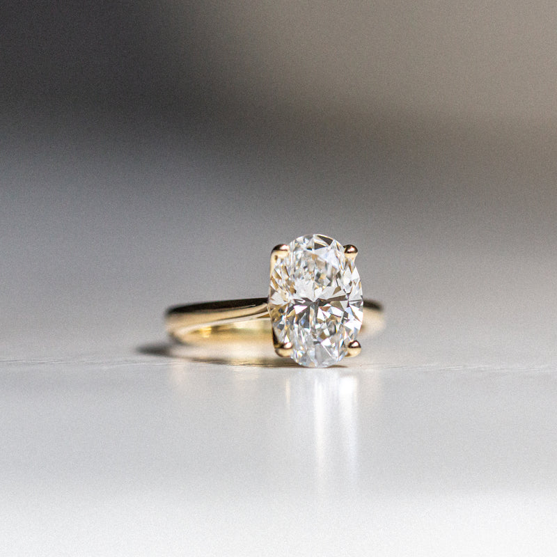 Byron Bay | Classic Oval Solitaire - 3.3Ct GIA Certified D, VS1 Lab Diamond Ring closeup daylight