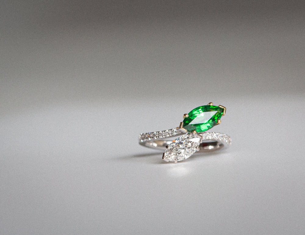 Daintree | Flutter | Toi et Moi - Natural Flawless Diamond & Vivid Emerald Green Tsavorite Ring Front view