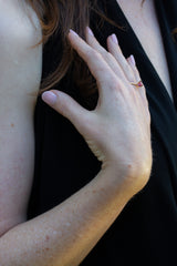 Solitaire Mahenge Red Pink Spinel Ring on chest