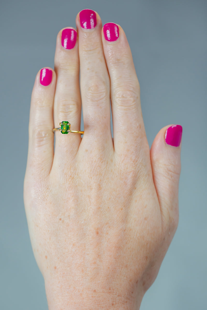 1.24Ct Vivid green Kenyan Tsavorite | Emerald Shape on hand