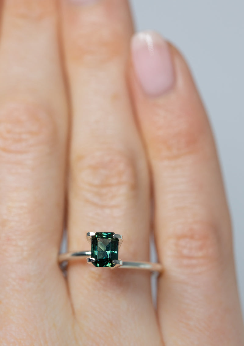 Spectacular 1.17Ct Blue Green Teal Sapphire | Emerald Shape from Madagascar on ring finger