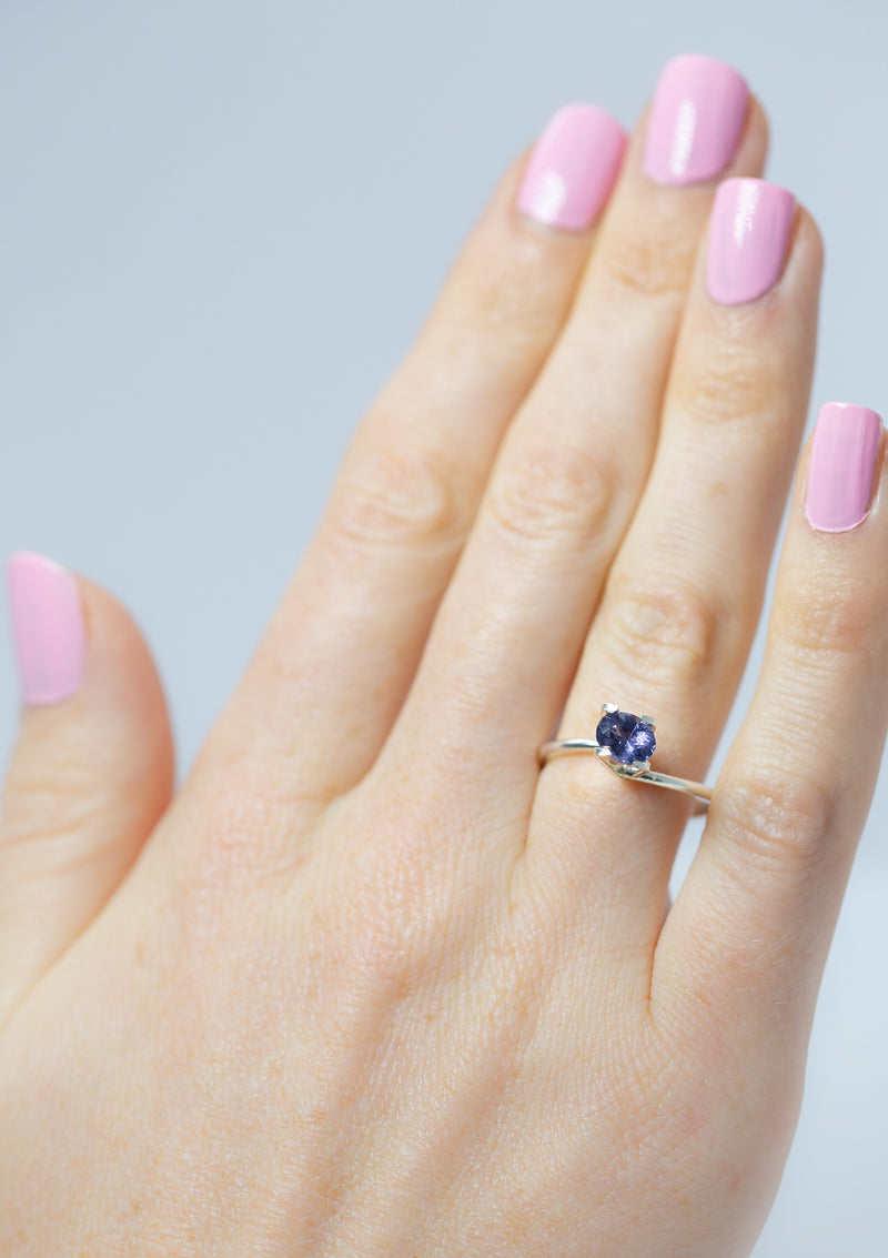 Natural, rare 0.76Ct Violet Spinel | Oval Shape from Sri Lanka on hand